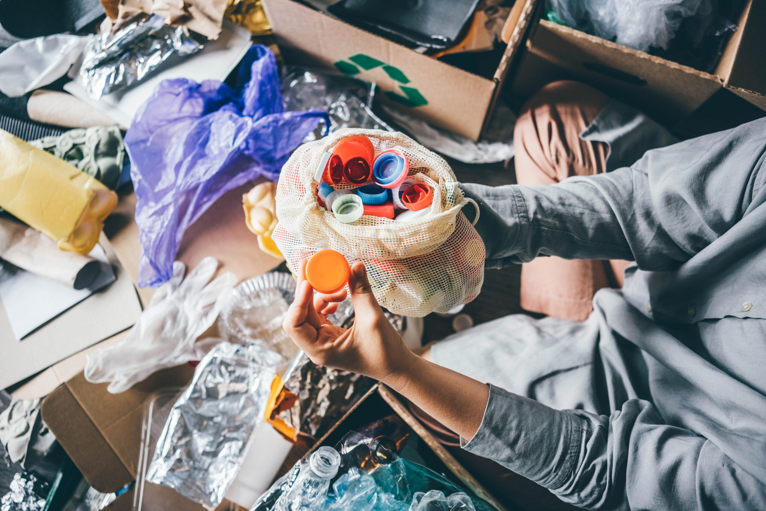 Woman sorting different waste girl holding a plas 2025 01 09 05 04 18 utc